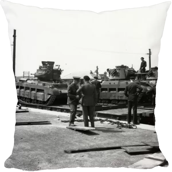 Tanks being loaded onto Rectank flat wagons, c. 1940