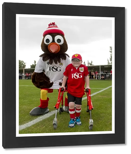 Bristol City's Oskar Pycroft and Scrumpy the Mascot at Pre-Season Friendly, 2015