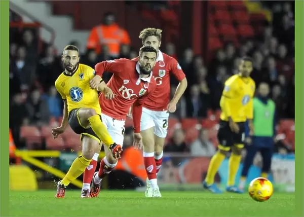 Marlon Pack of Bristol City Closes Down Sammy Moore of AFC Wimbledon during Johnstone's Paint Trophy Match