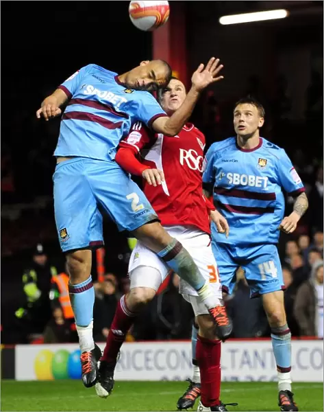 Intense Aerial Battle: Chris Wood vs. Winston Reid, Bristol City vs. West Ham United