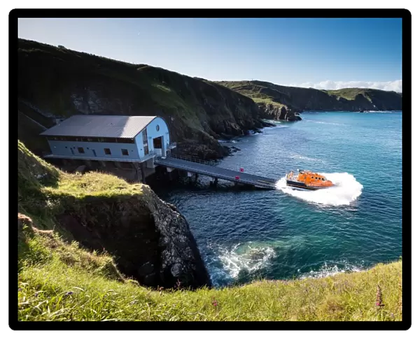 Lizard Tamar class lifeboat Rose 16-20 being launched down the slipway on a training exercise