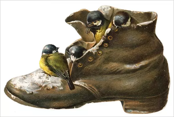 Battered old boot-shaped Christmas card