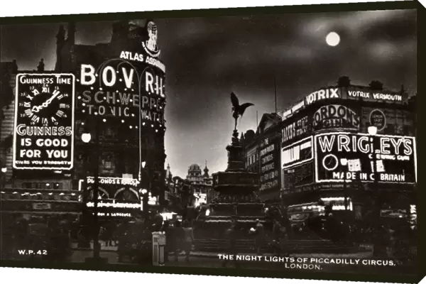 The neon lights of Piccadilly Circus at night, London