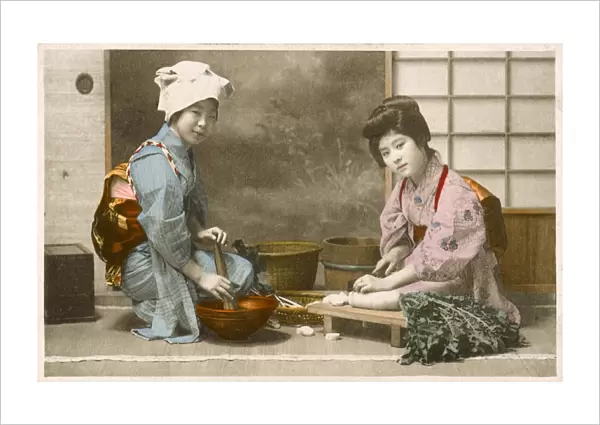 Japan - Women preparing food including chopping a daikon
