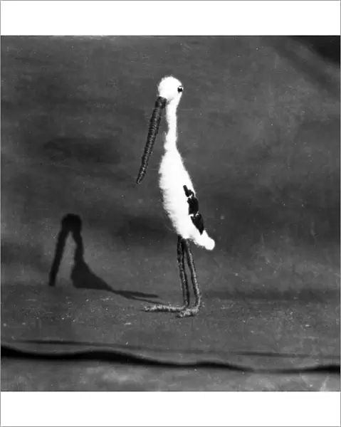 TOY STORK. A toy stork, a mascot made of wire and wool. Date: early 1930s
