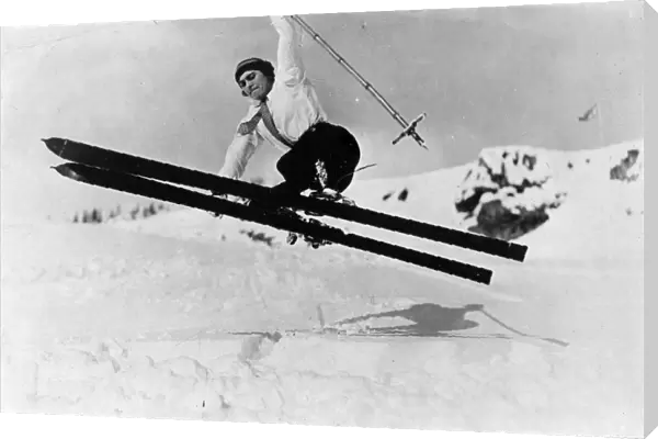 SKI JUMP. An energetic skier flying through the air! Date: 1930s