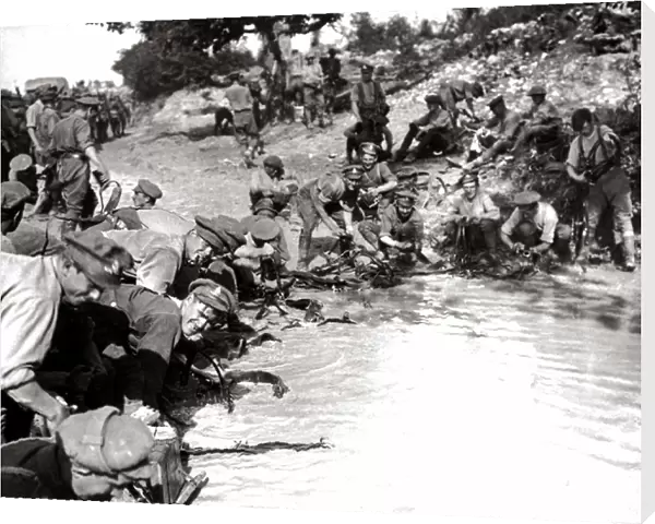 British soldiers cleaning harness in pond, WW1