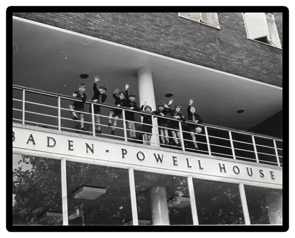 Cubs waving from Baden Powell House, London
