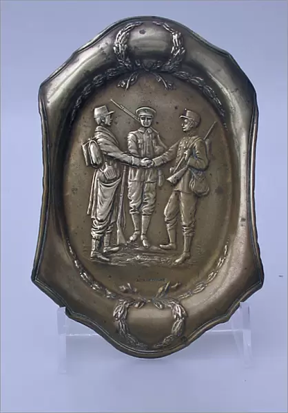 Brass ashtray showing French, British and Belgian soldiers