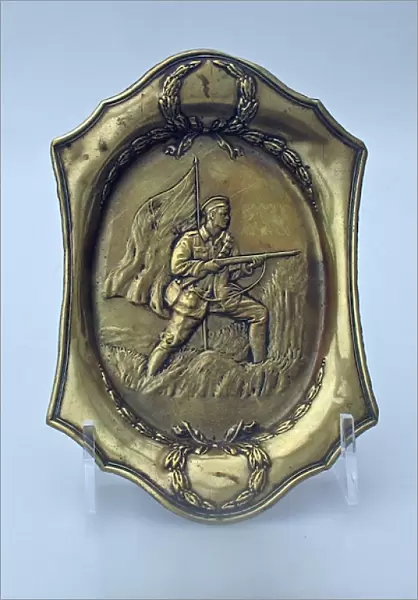 Patriotic ashtray showing a British Tommy on a battlefield
