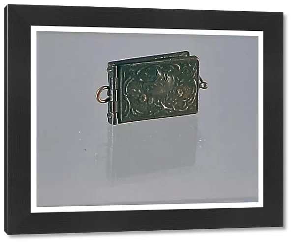 Metal cased album containing miniature WWI photographs