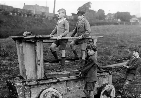 Boys on an 18th century fire engine, Wirksworth