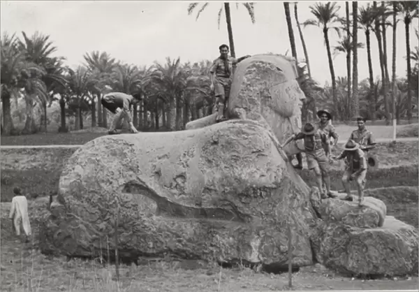 Boy scouts on an alabaster Sphinx, Egypt