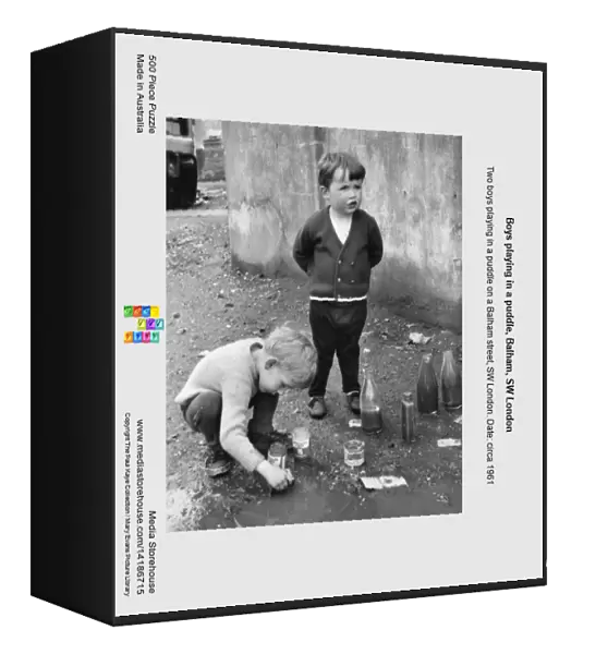 Boys playing in a puddle, Balham, SW London