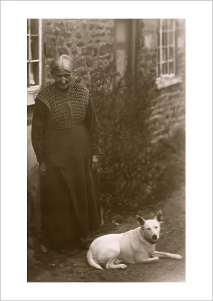 Old lady with a white dog