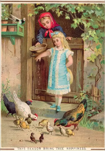 Two girls with hens and chicks on a Christmas card