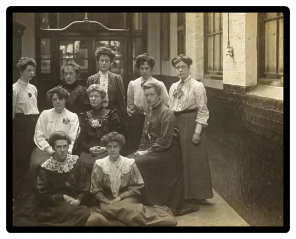 Group photo of women teachers in a school building