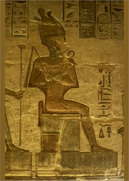 Ptolemaic temple of Hathor and Maat. God Osiris. Seated figu