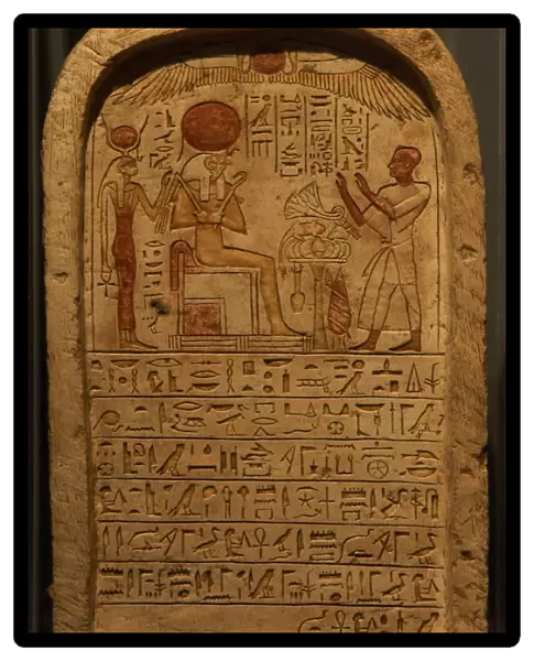 Stele depicting a priest making an offering to the god Ra. E