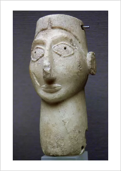 Stone Head. Represent a god, goddess or a worshipper. Late U