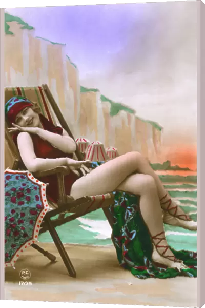France - Jolly girl in a bathing costume on a deckchair