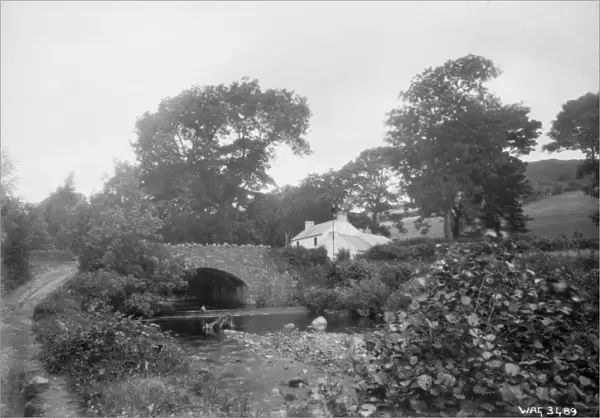 A stone arched bridge and building, Glenballyemon, Cushendal