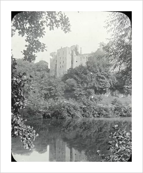 Ludlow - view across river, Ludlow castle behind trees.