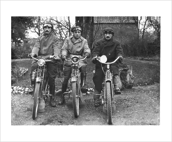 Three bikers on veteran motorcycles