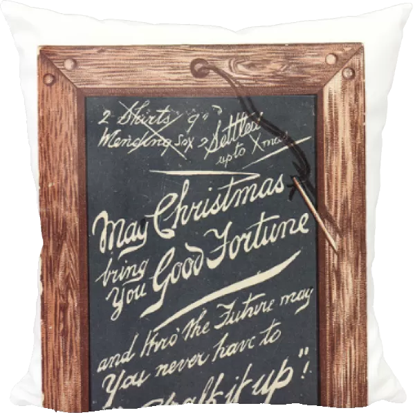 Slate with pen and comic greeting on a Christmas card
