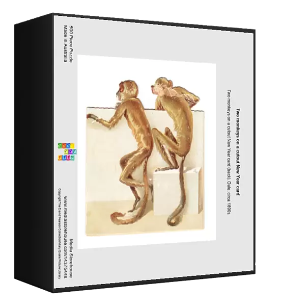 Two monkeys on a cutout New Year card