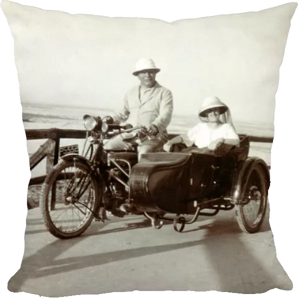 Gentleman & lady on their 1910 Triumph motorcycle & sidecar