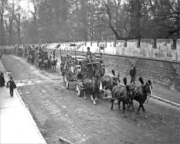 Circus troupe procession with horse-drawn carriages