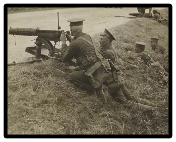 British, with machine guns, take up a position in a ditch in