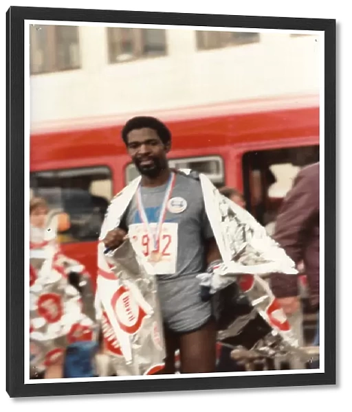 British Caribbean marathon runner, with foil wrap