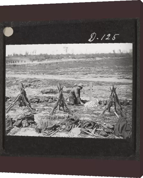 Tending a grave near Mametz Wood, August 1916