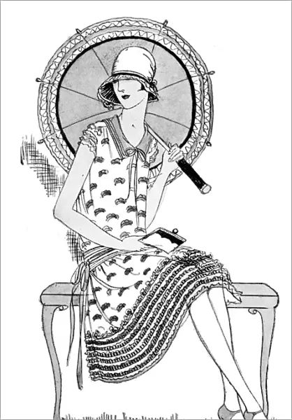 Woman sits with parasol