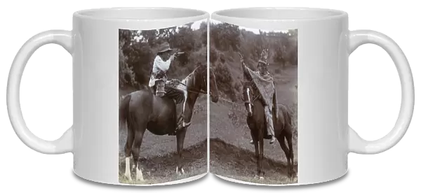 Two boys on horseback playing Cowboys and Indians