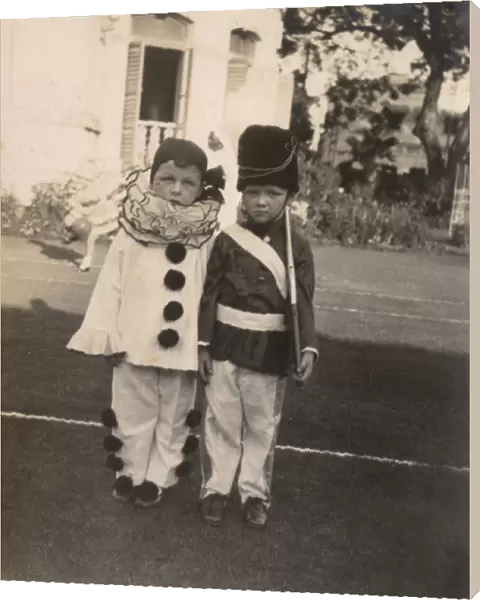 Children in clown and soldier fancy dress