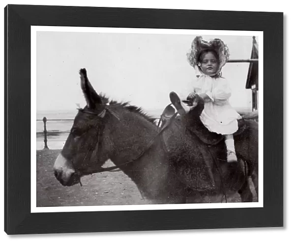 Little girl on a donkey, Saltburn, North Yorkshire