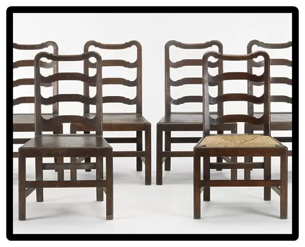 Six ladder-back chairs