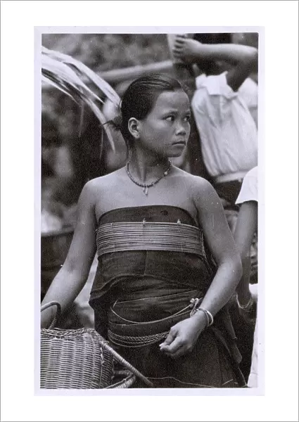 A girl of the Dusan People, Sabah State, North Borneo