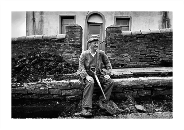 Labourer Mr Idris Silman takes a break, Tredegar, Wales