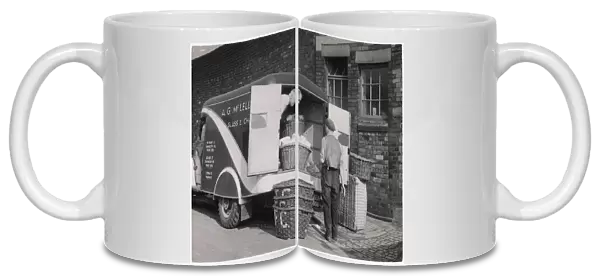 LOADING VAN WITH POTTERY