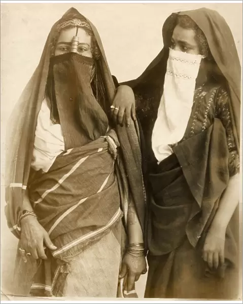 Two young Egyptian women wearing veils Date: late 19th century