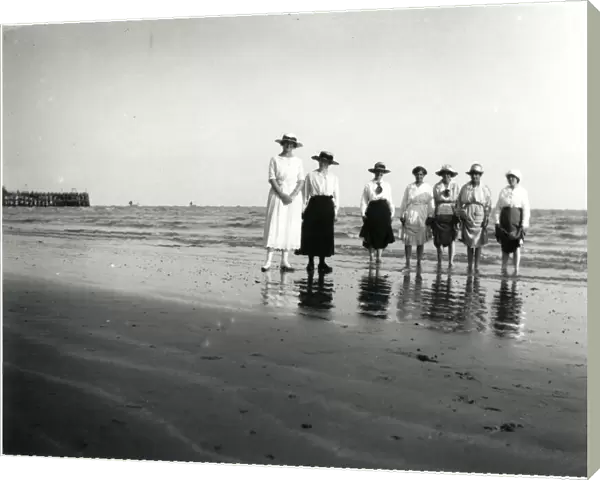 Group of women paddling at a British seaside resort