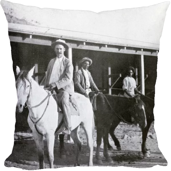 Mounted police constable and aborigine trackers on patrol