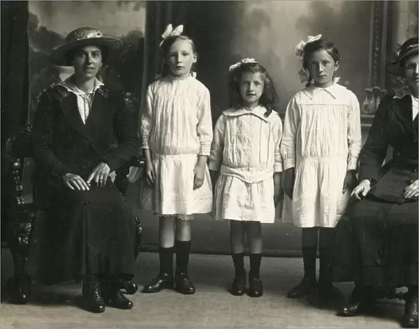 Three Young girls with their Mother and their Aunt (?)