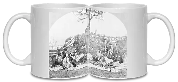 Group photo, people at a picnic to celebrate a wedding