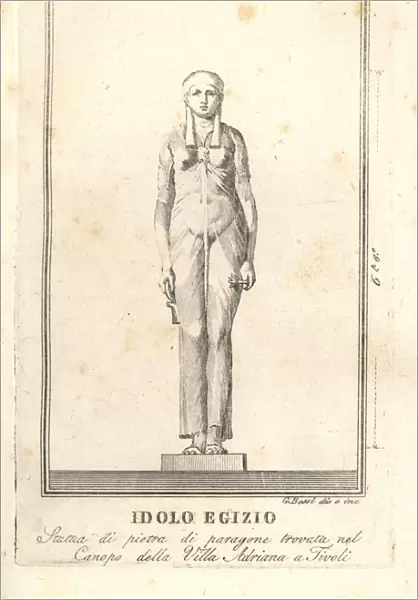 Statue of an Egyptian idol in diaphanous robe