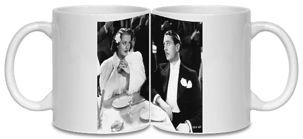 Lynn Carver and Reginald Gardiner in Everybody Sing (1938)
